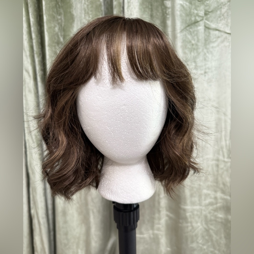 Short wavy brown bob wig with bangs. Jon Renau January in Mousse Cake.